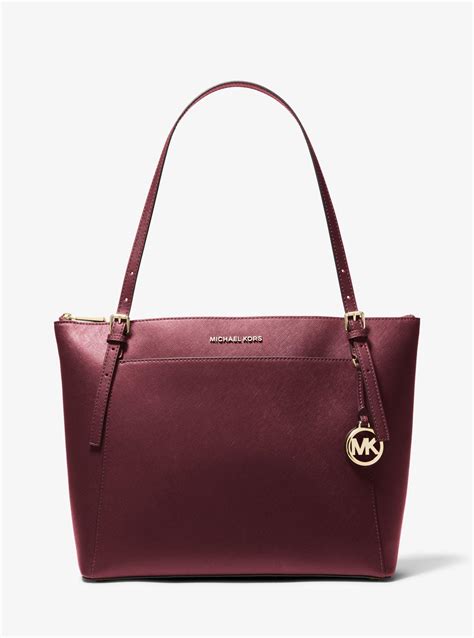 michael kors metallic voyager tote|Michael Kors voyager tote merlot.